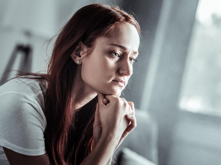 woman suffering from alcohol addiction
