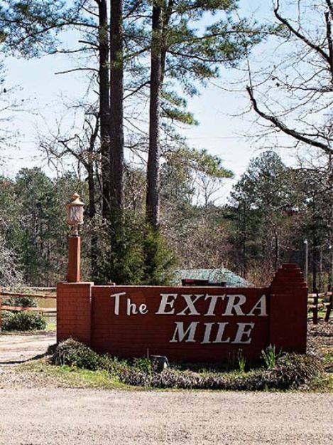 Entrance sign at Extra Mile rehab in Mantachie.