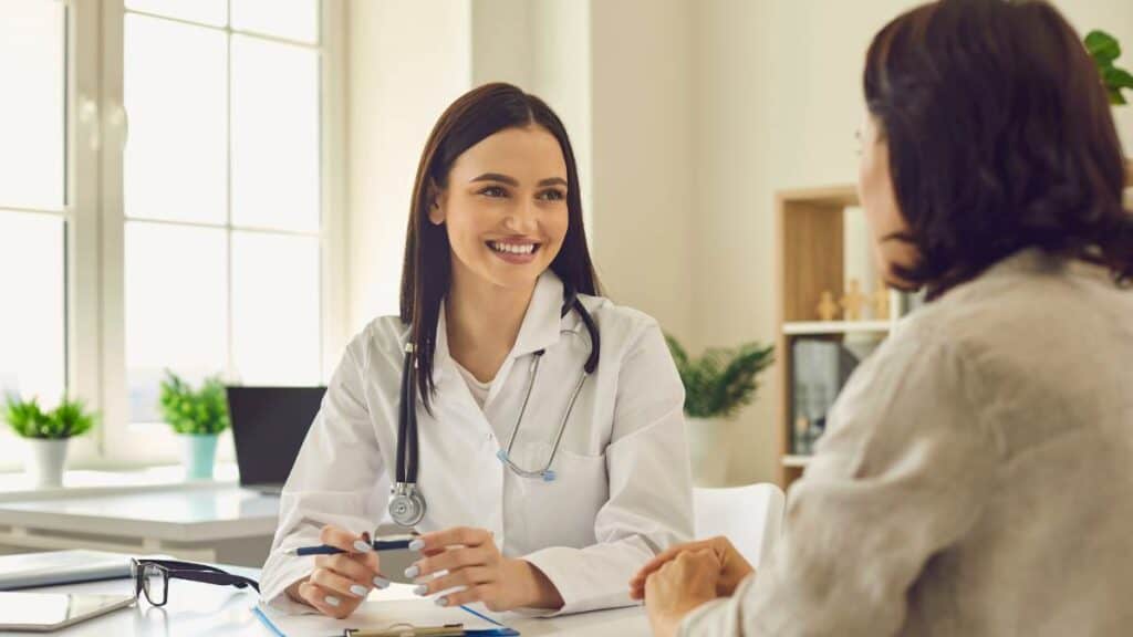 A profession talking to a client during an appointment at rehab for veterans in Mississippi.