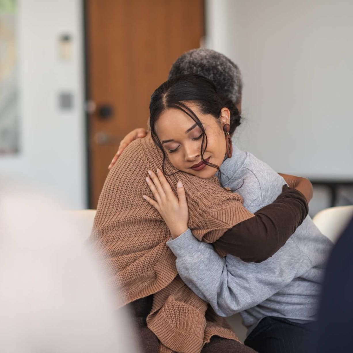 A woman hugs a loved one during her time at rehab near Oxford, MS.<br />
