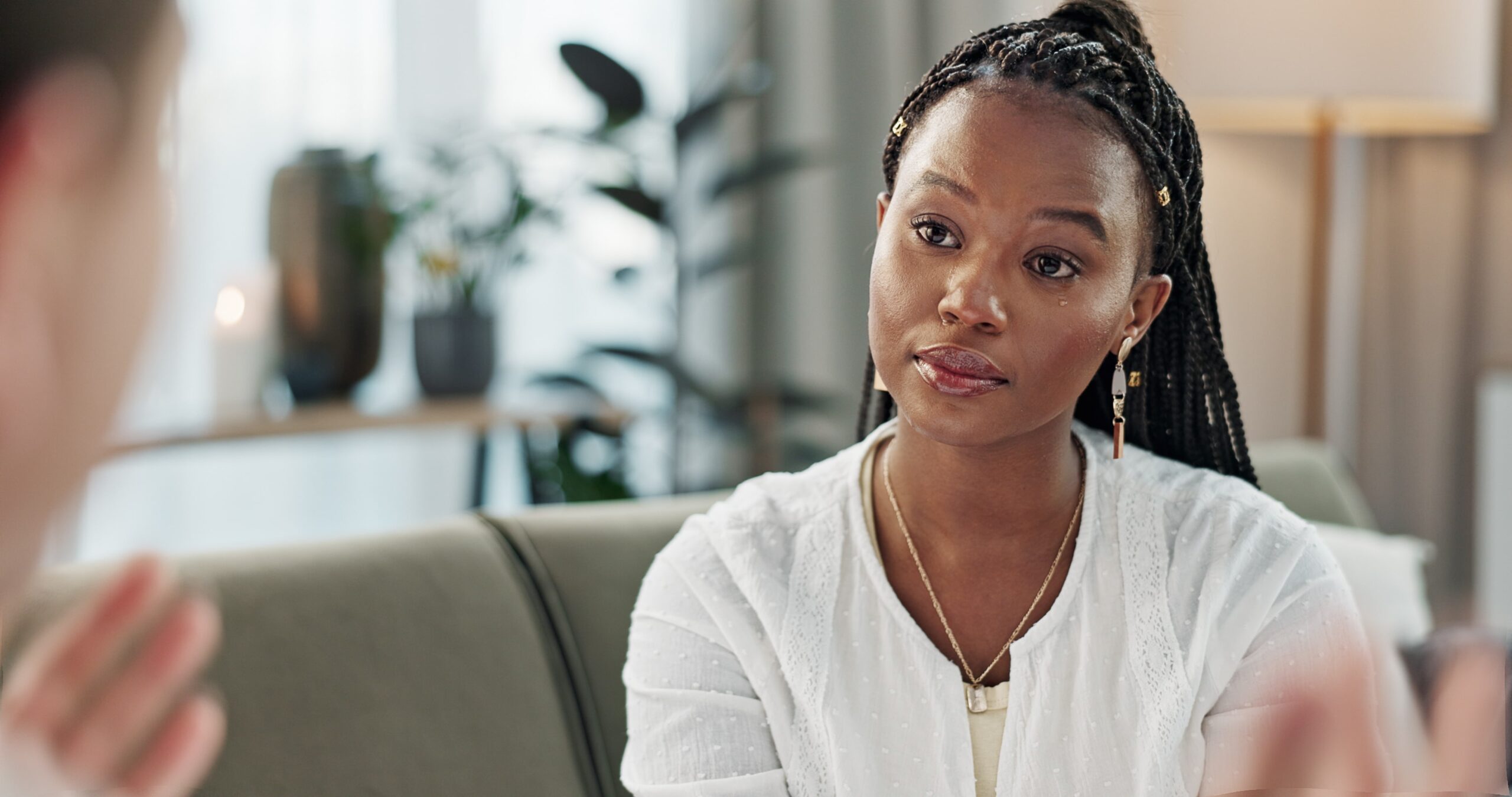 A woman discusses humana rehab coverage in Mississippi during therapy.