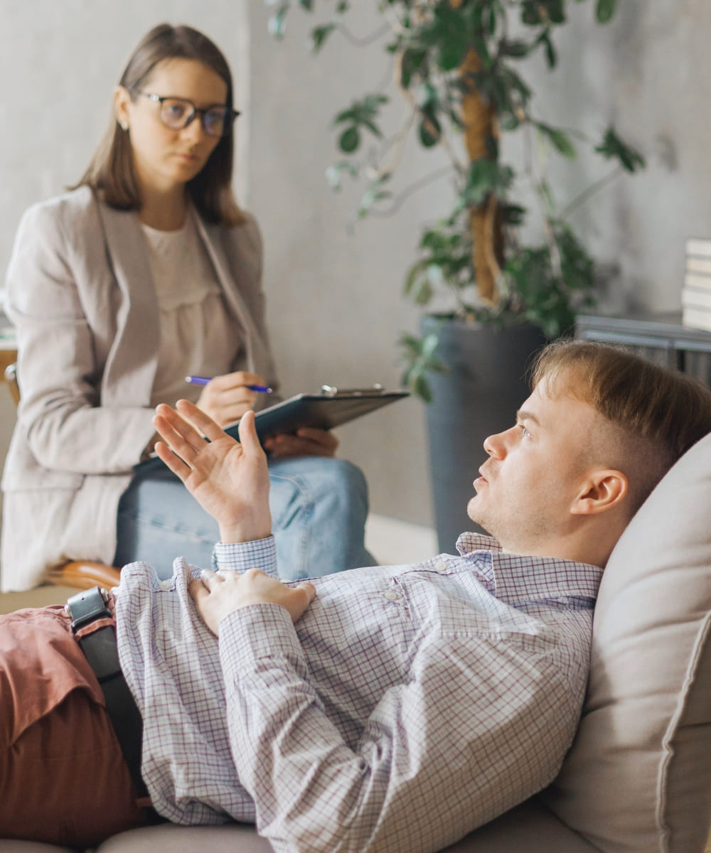 Therapy session at Extra Mile's chronic relapse treatment centers in Mississippi. 