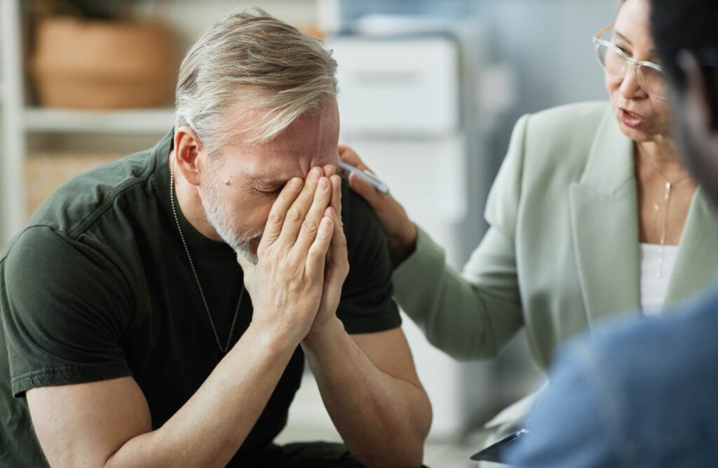 Man coping with meth withdrawal symptoms.