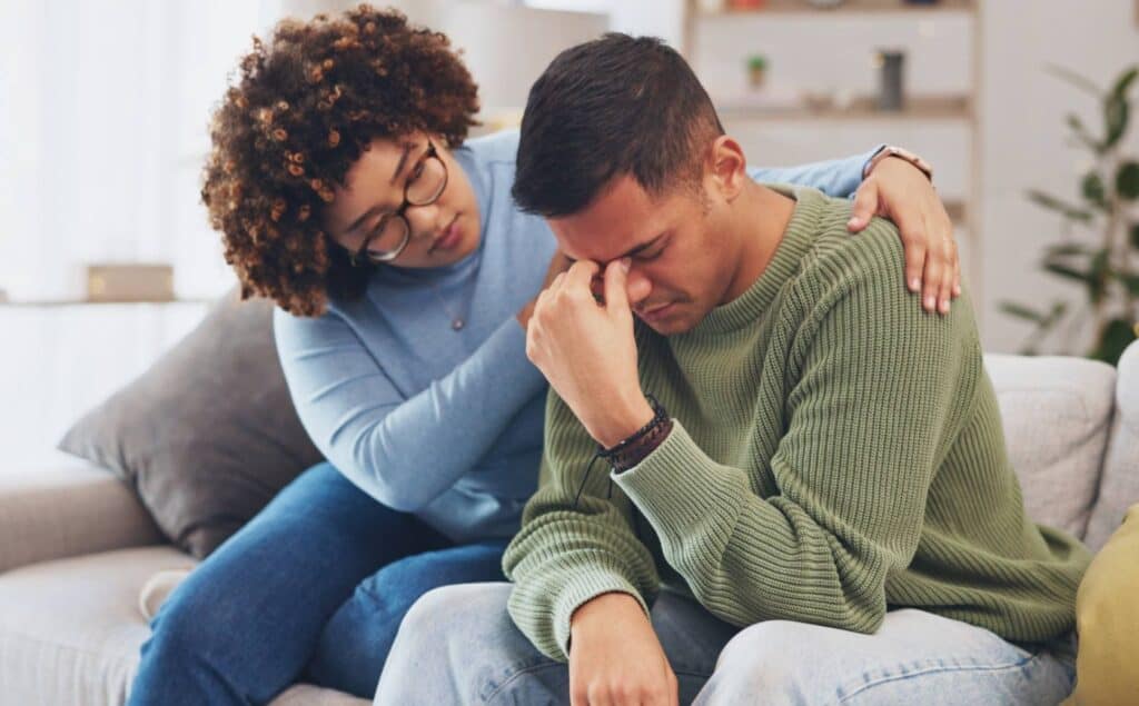 Woman offering support to a loved one dealing with Xanax and alcohol dependency.