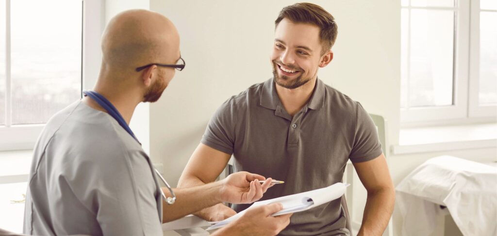 A doctor assists a man with MAT, exploring how long does alcohol withdrawal lasts.