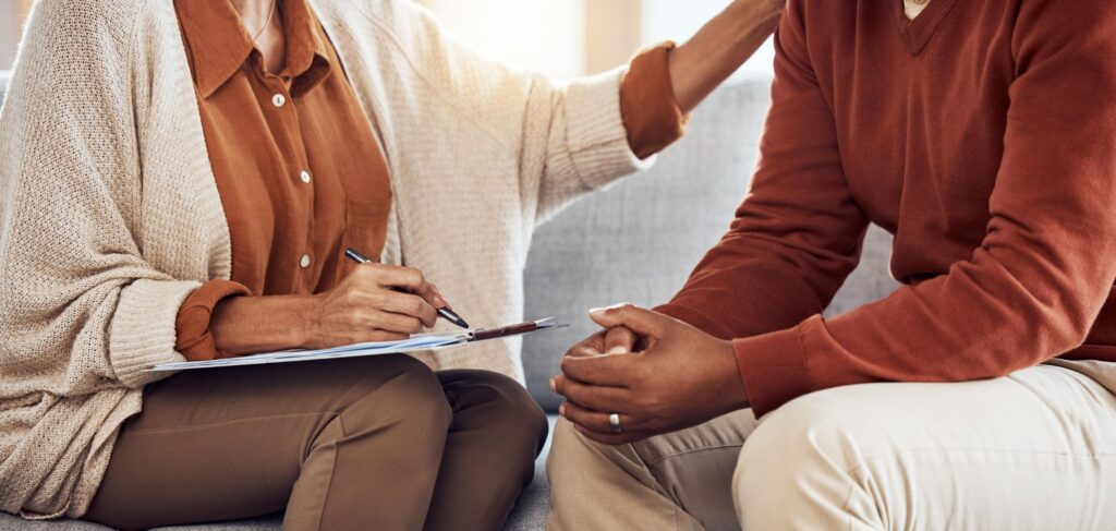 A therapist supports a client discussing 'how long does alcohol withdrawal last?'.