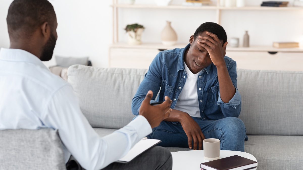 A man shares his experiences with his therapist during CPTSD treatment in Mississippi