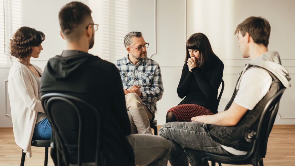 A professional leads the conversation during intervention services in Mississippi.