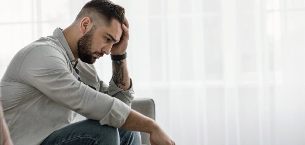 man struggling with Oxycodone addiction.