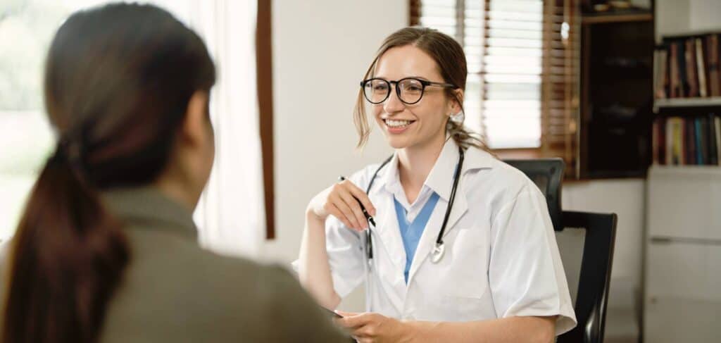 Doctor supporting a client with dual diagnosis during panic disorder treatment in Mississippi.