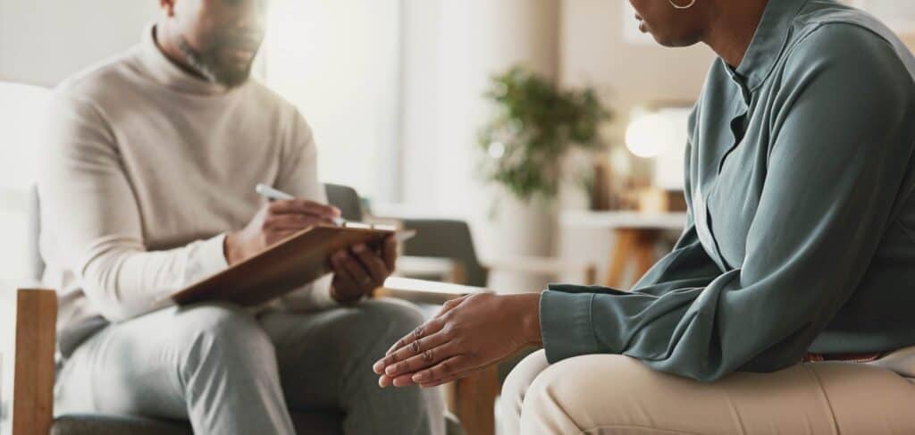 Individual speaking with their therapist during Percocet addiction treatment in Mississippi.
