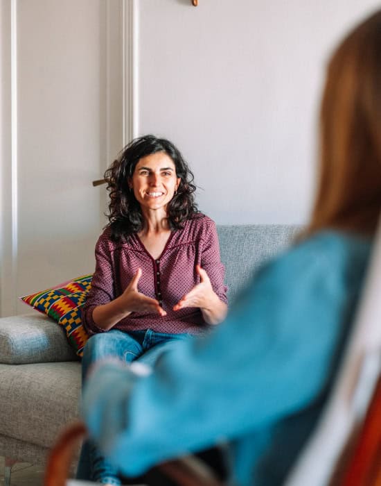 A woman enjoys personalized individual therapy as part of recovery treatment.