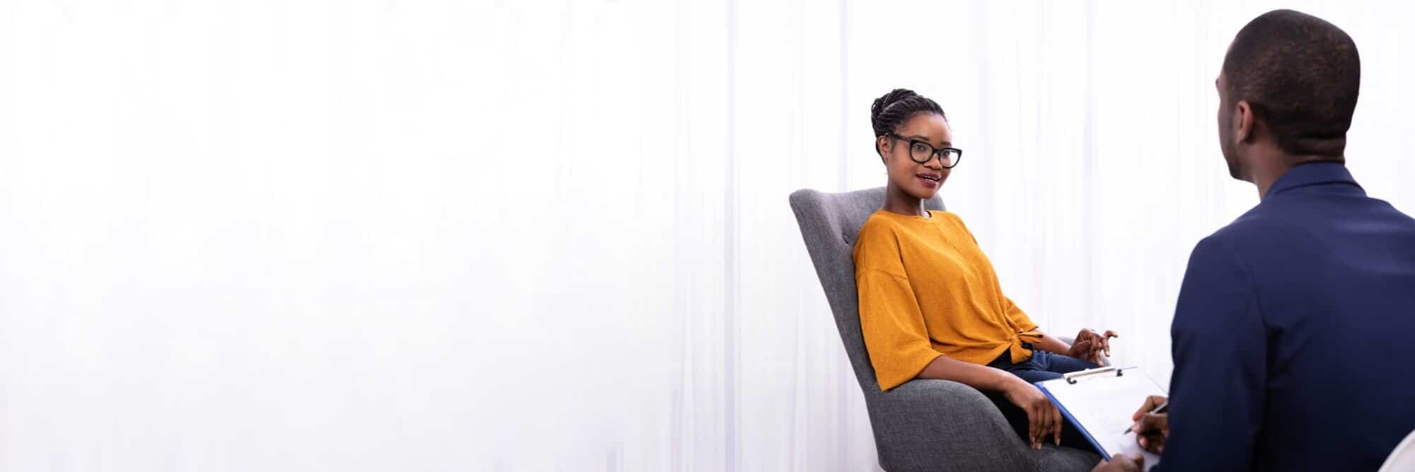 a man talks to his therapist about Humana rehab coverage in Mississippi.