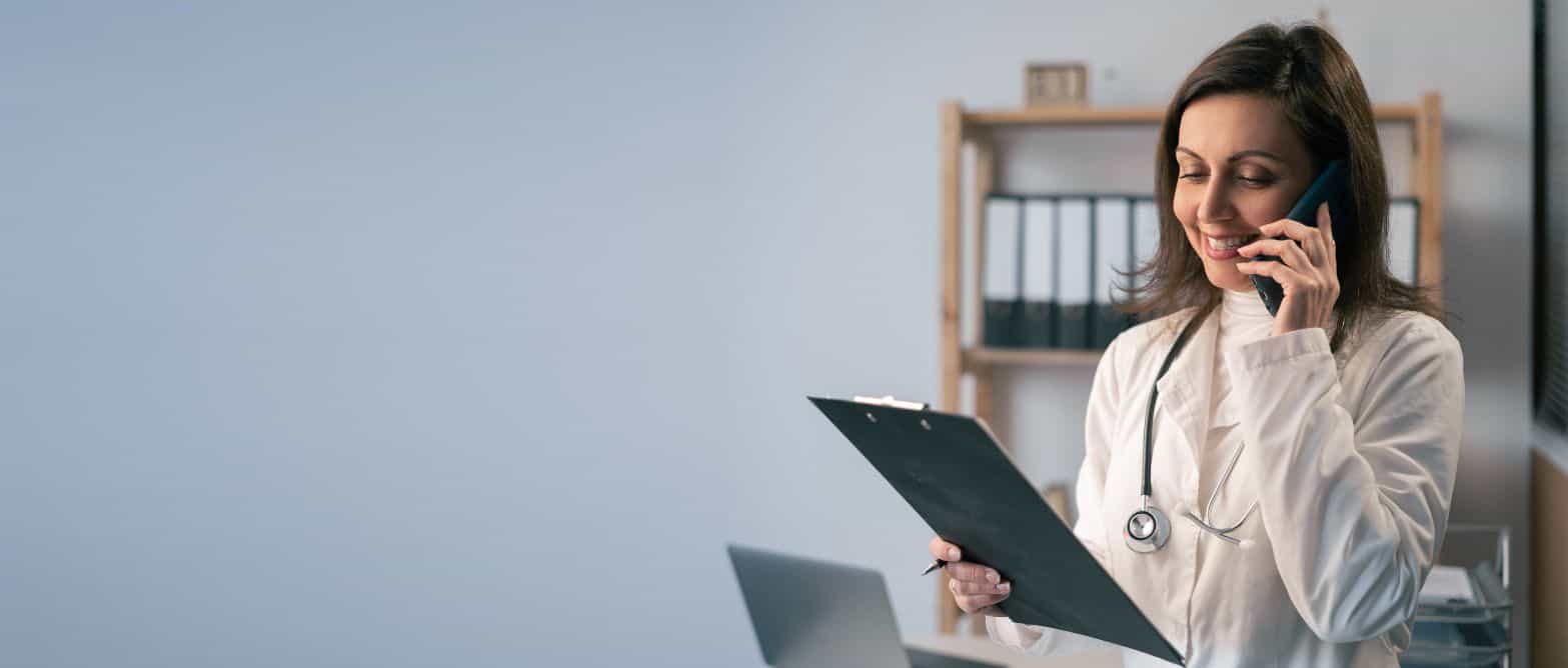 A doctor talks to a client about humana rehab coverage in Mississippi.