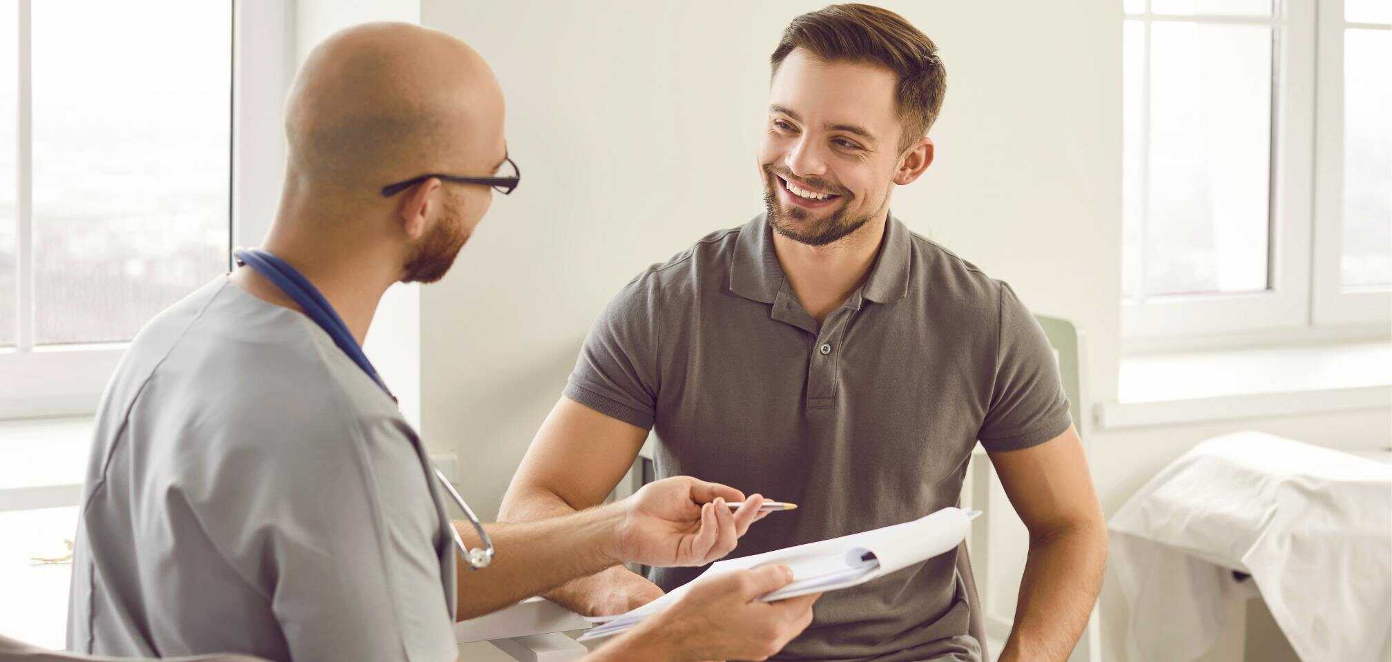 Man speaking with a doctor during a marijuana abuse treatment program in Mississippi.
