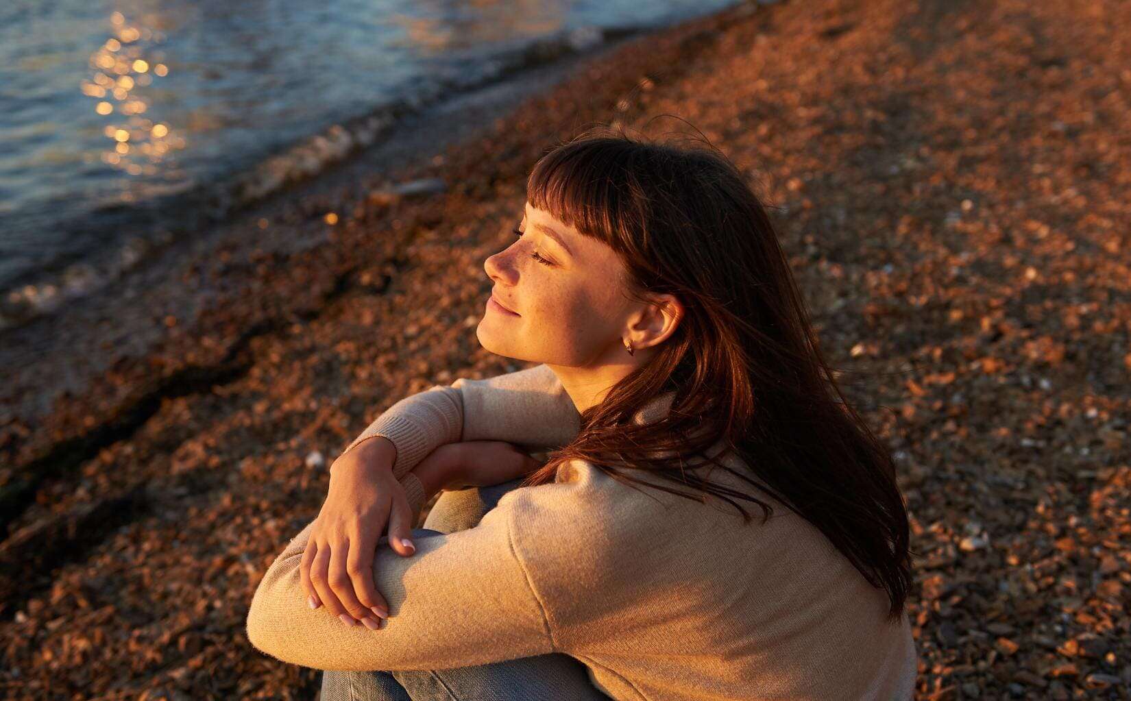 Young woman looking calm and refreshed after anxiety treatment in Mississippi.